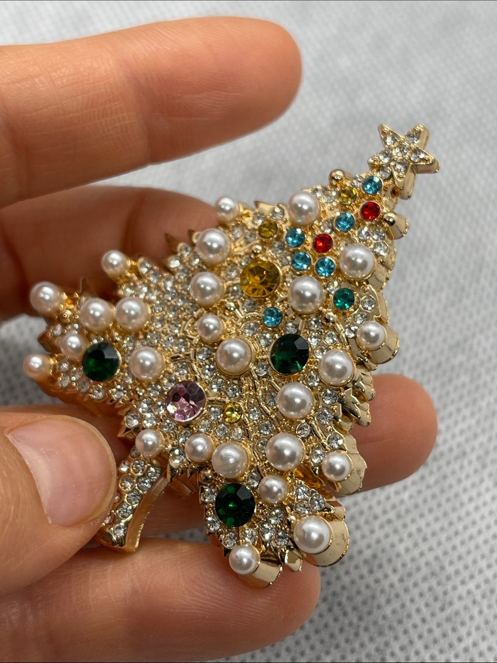 Golden tone Christmas tree brooch